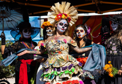 women in La Catrina costumes