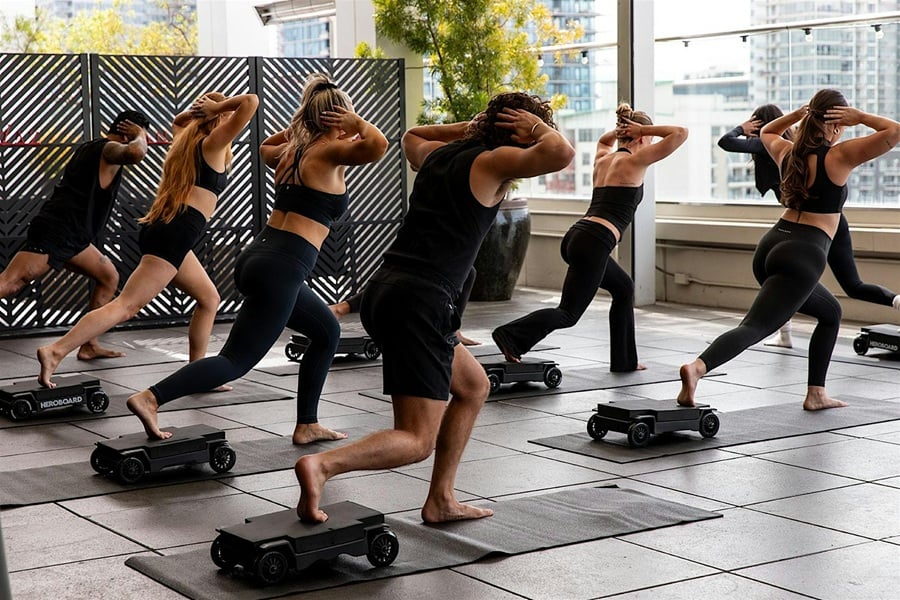 Rooftop Pilates class overlooking the downtown San Diego skyline