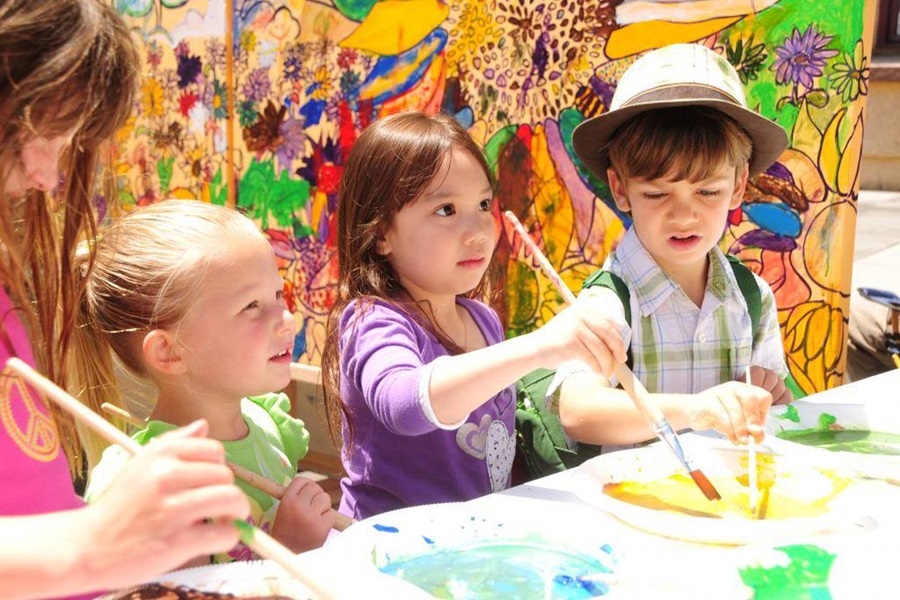 three kids painting