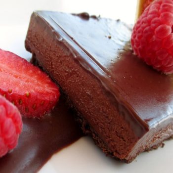Chocolate mousse with raspberry and strawberry toppings