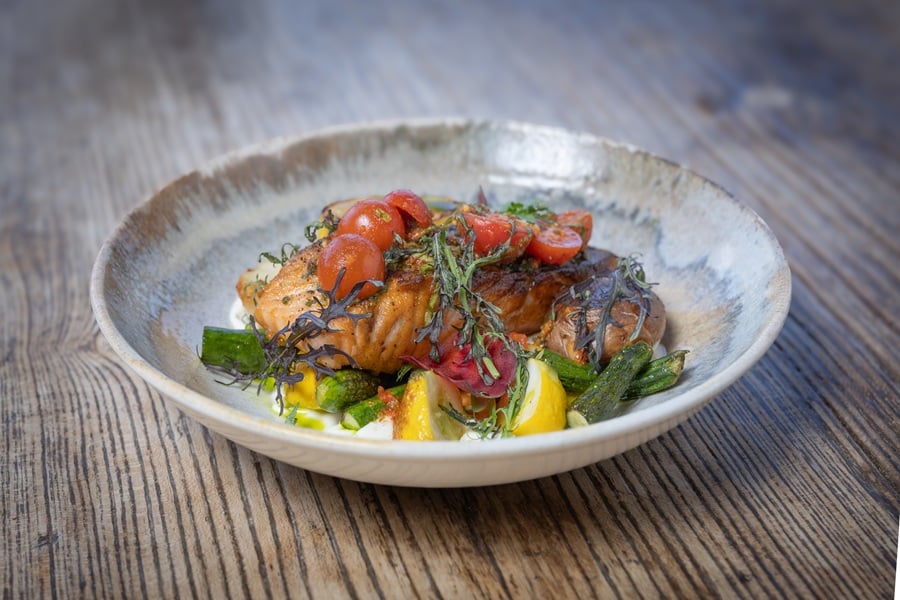 Ember-roasted Pork Chop with mesquite tomato marmalade at Corkfire