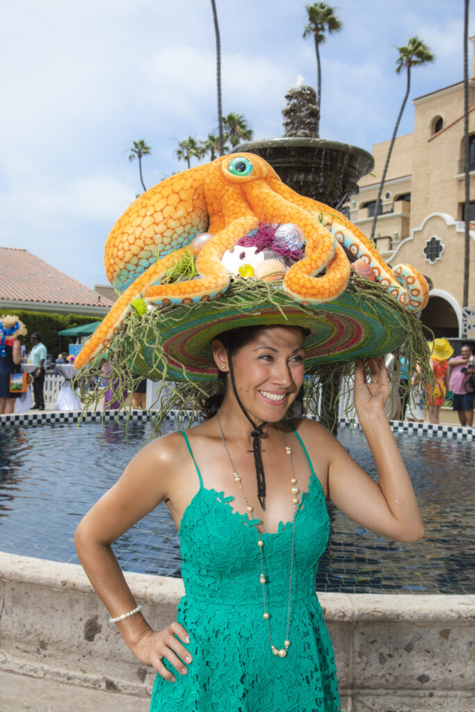 woman wearing a big octopus hat