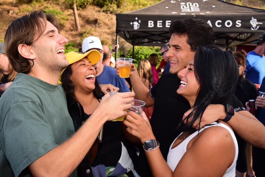 people happily drinking beer