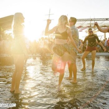 People dancing in the water