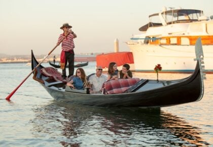Family enjoying Father's Day gondola cruise through the Coronado Cays