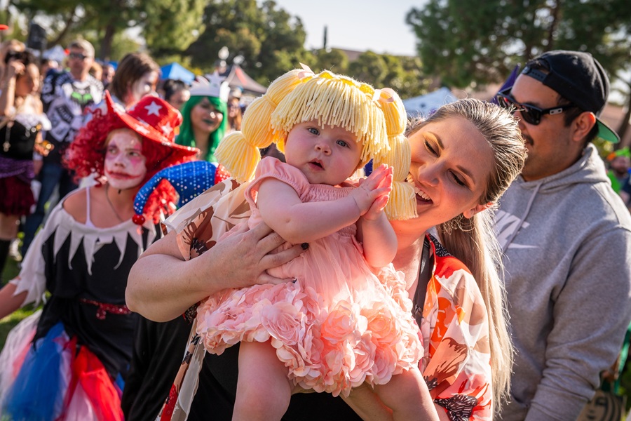 Families enjoying a fall afternoon at Halloween at the Station