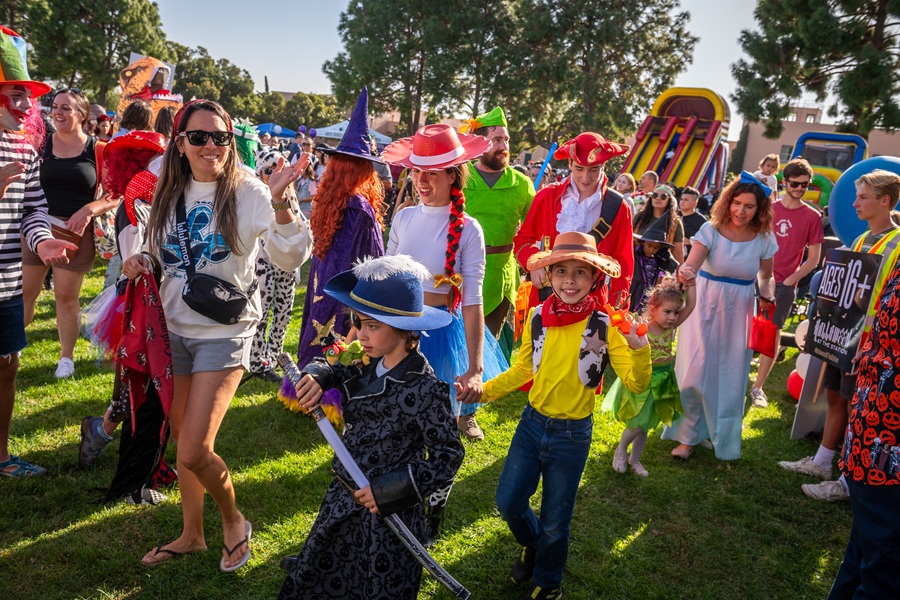 Families in costume at Halloween at the Station