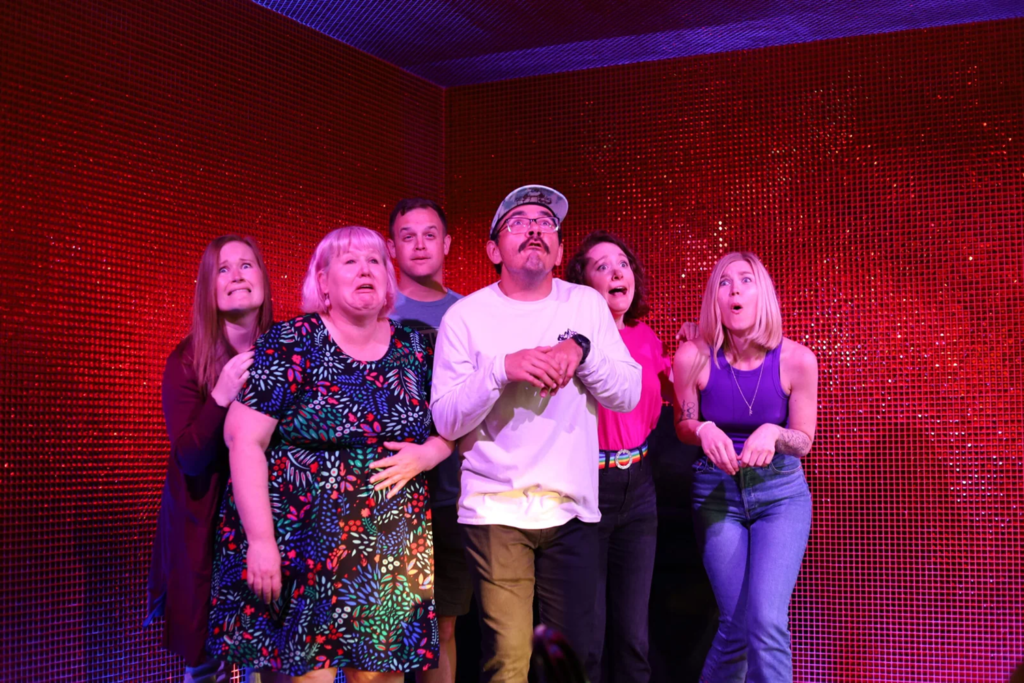Comedians take the stage at IMPRIDE for the Holidays