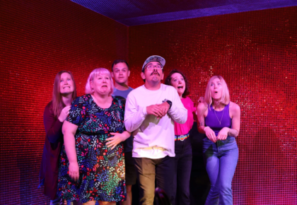 Comedians take the stage at IMPRIDE for the Holidays