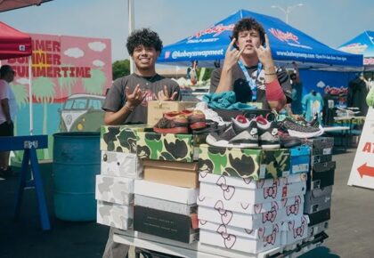 2 guys and boxes of shoes