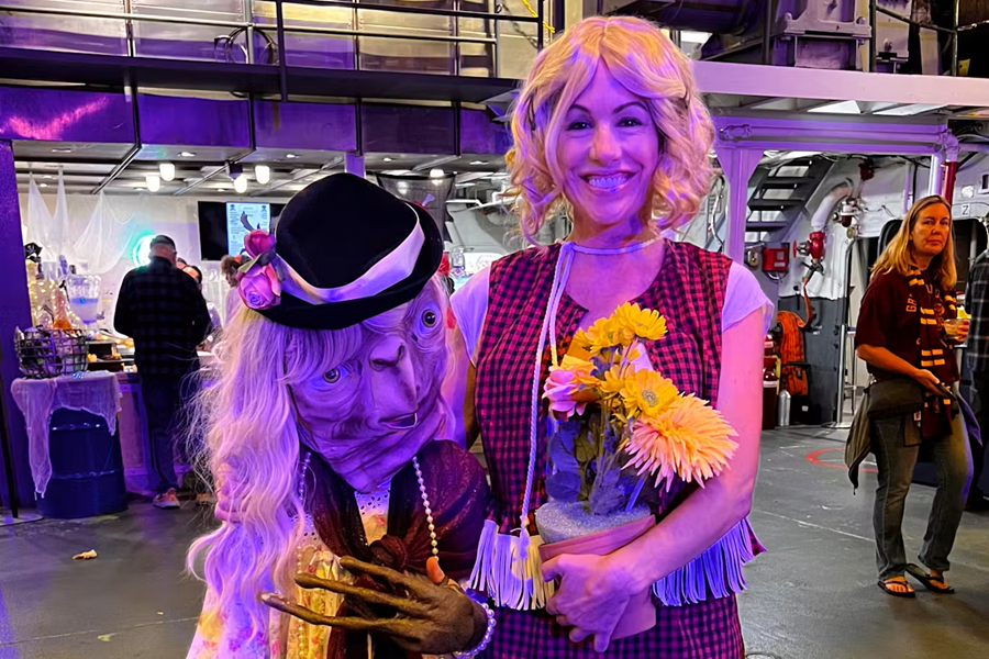 Costumed crowd enjoying Fright Deck on the USS Midway