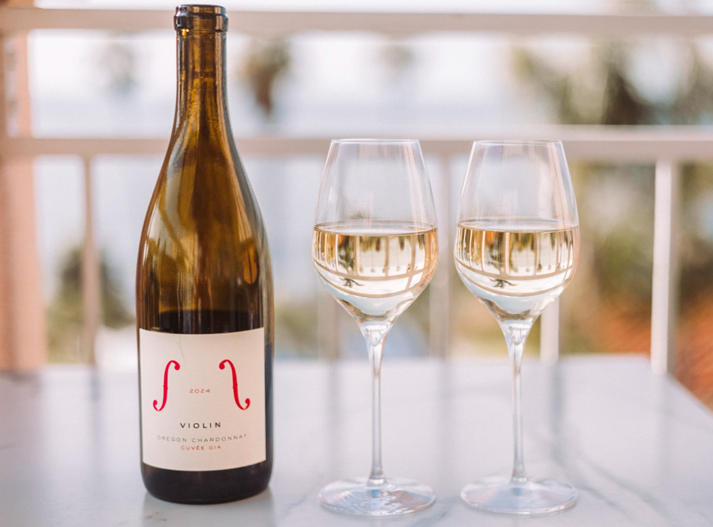a bottle of wine and two wine glasses