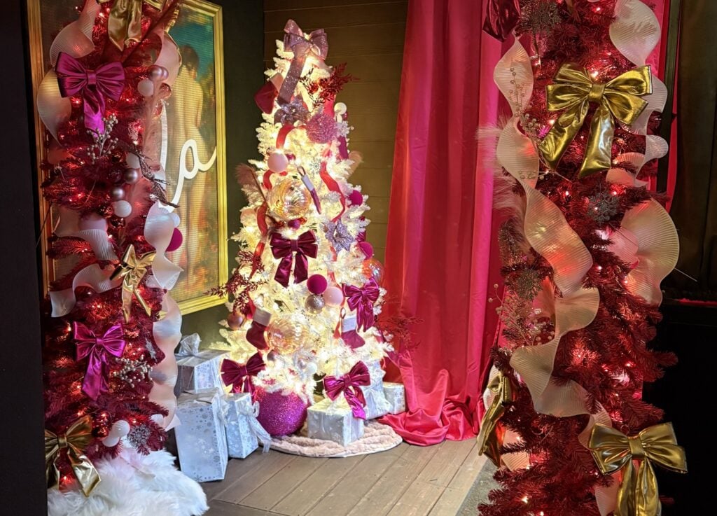 Pink Christmas trees lighting up Lala's Pink Themed Christmas