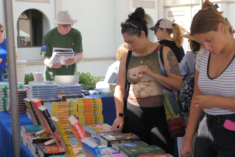 Crowd browsing books at the KPBS San Diego Book Festival