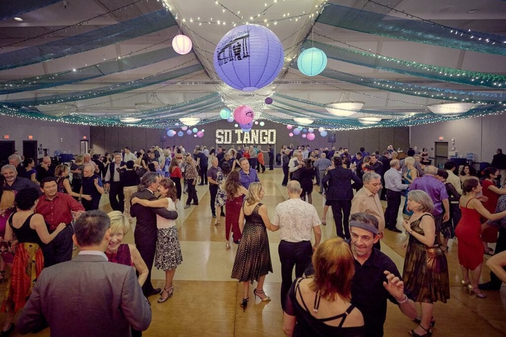 Dancers glide across the floor at the San Diego Tango Festival