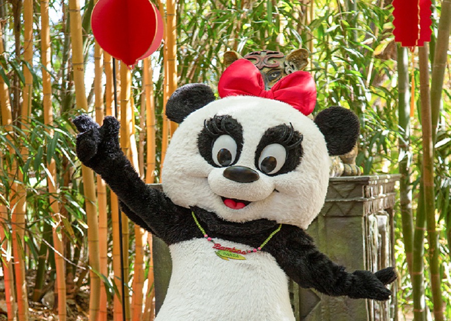 a person wearing a panda costume
