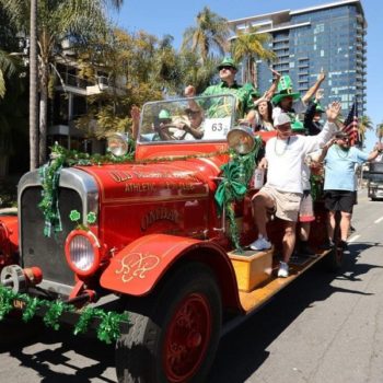 vintage car joining a parade in San Diego
