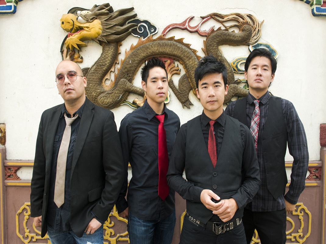 This image provided by Anthony Pidgeon via The Slants, a portrait of Asian-American band The Slantsm, from left, Joe X Jiang, Ken Shima, Tyler Chen, Simon "Young" Tam, Joe X Jiang) in Old Town Chinatown, Portland, Ore., on Aug. 21, 2015. In a First Amendment clash over a law barring offensive trademarks, the Supreme Court on Jan. 18, 2017, raised doubts about a government program that favors some forms of speech but rejects others that might disparage certain groups. The justices heard arguments in a dispute involving an Asian-American band called the Slants that was denied a trademark because the U.S. Patent and Trademark office said the name is offensive to Asians. (Anthony Pidgeon/Redferns via The Slants via AP)