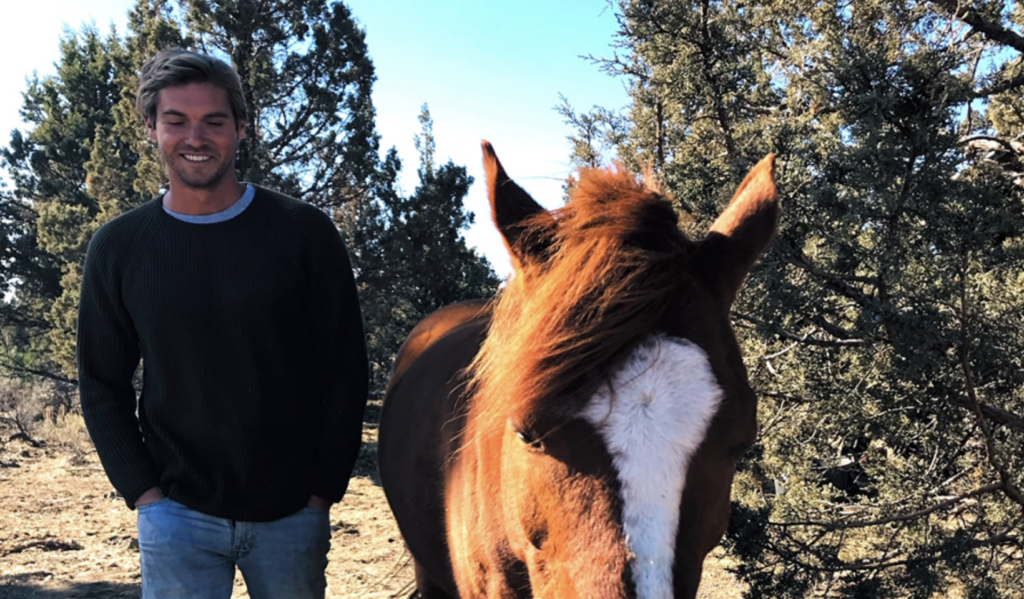 Travis Hook of CalTier Fund with his horse.