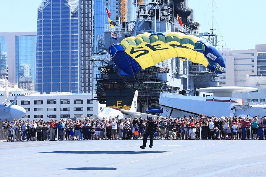 U.S. Navy Parachute Team "Leapfrogs" Demonstration At USS Midway