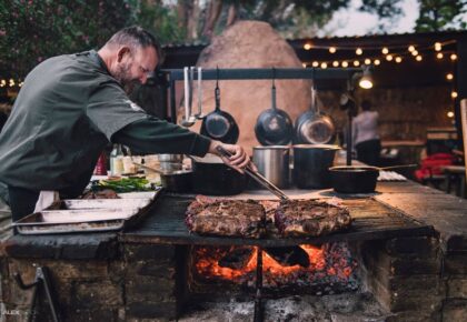 Chef Drew Deckman works the fire