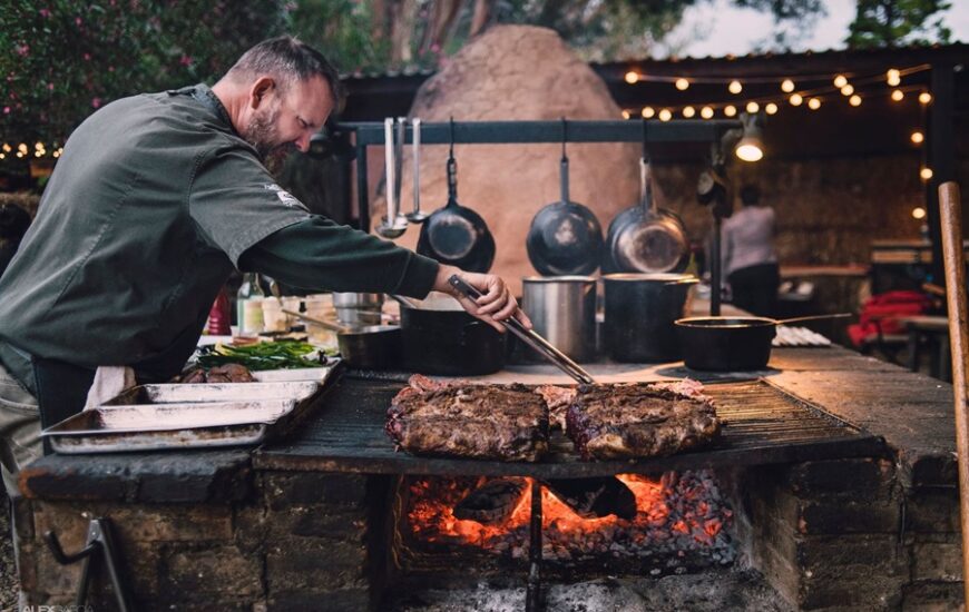 Chef Drew Deckman works the fire