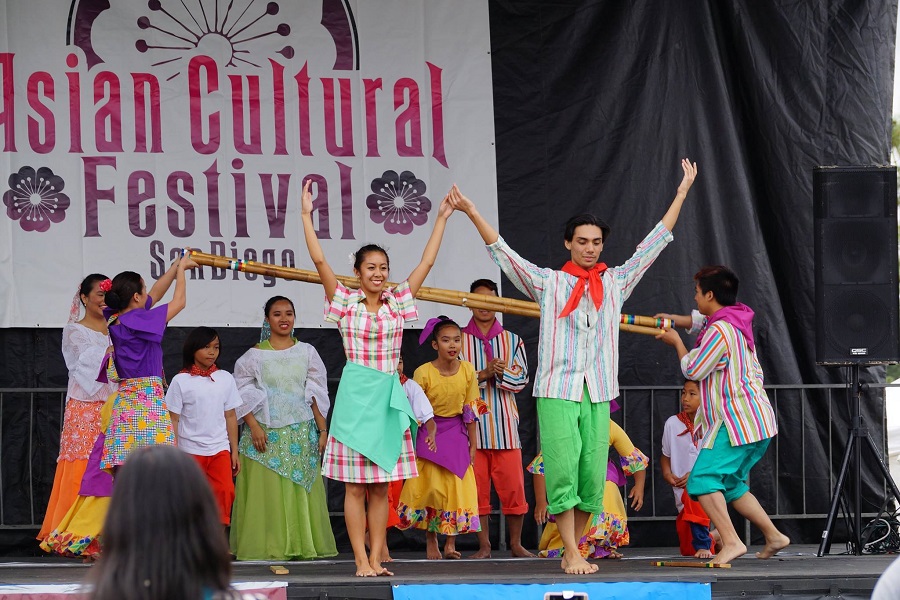 cultural performers on stage at the Asian Cultural Festival