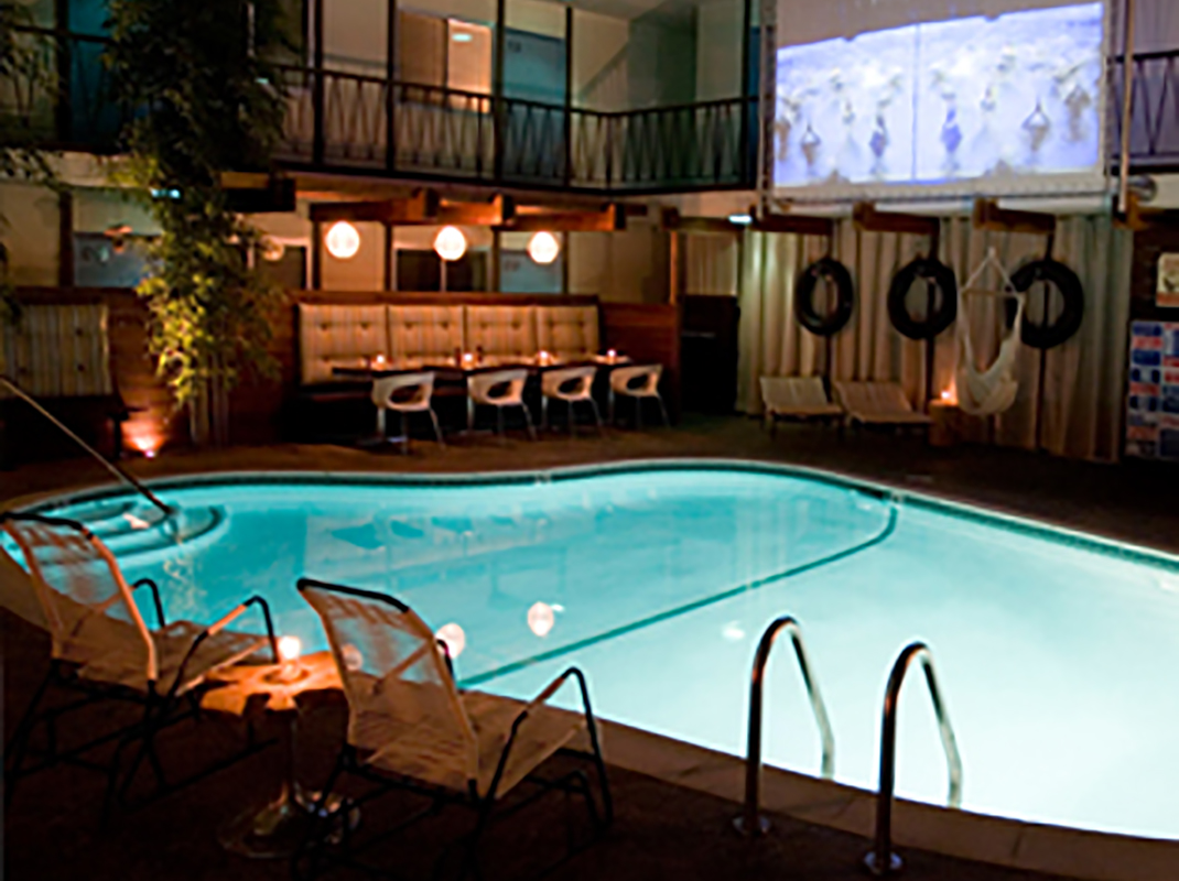 Watch Classic Christmas Flicks Poolside at the Pearl Hotel