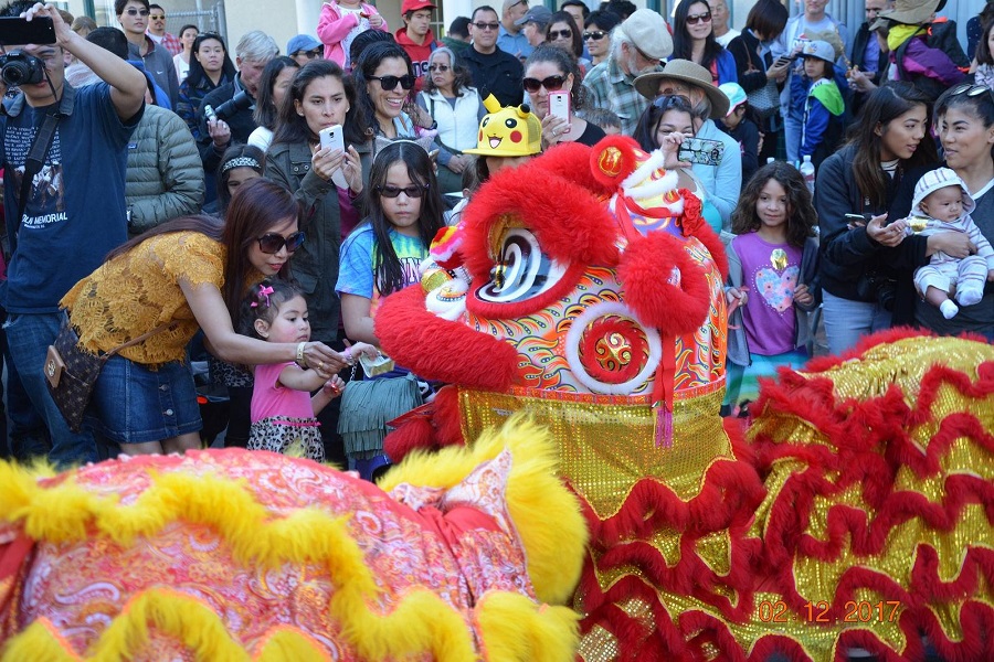dragon and lion dancers at the lunar new year event